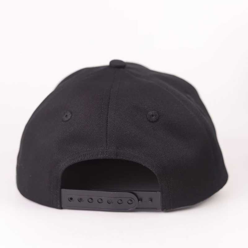 Rear view of a black cotton short-brim cap with plastic snapback closure
