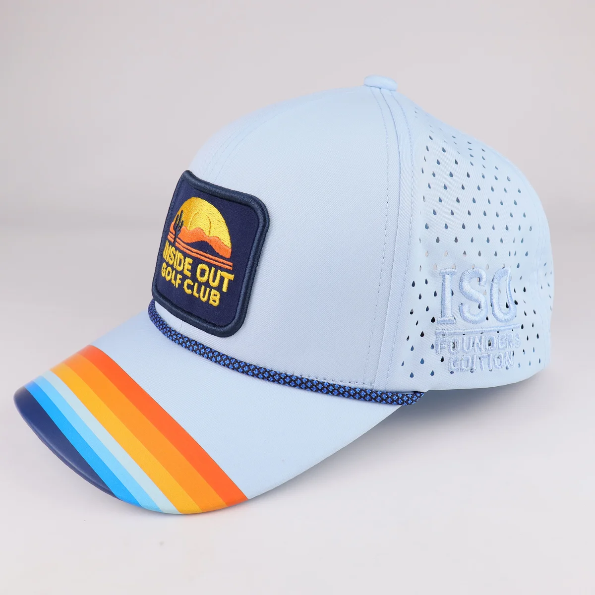 Side view of light blue rope cap showing perforated crown, side embroidery and multicolor visor